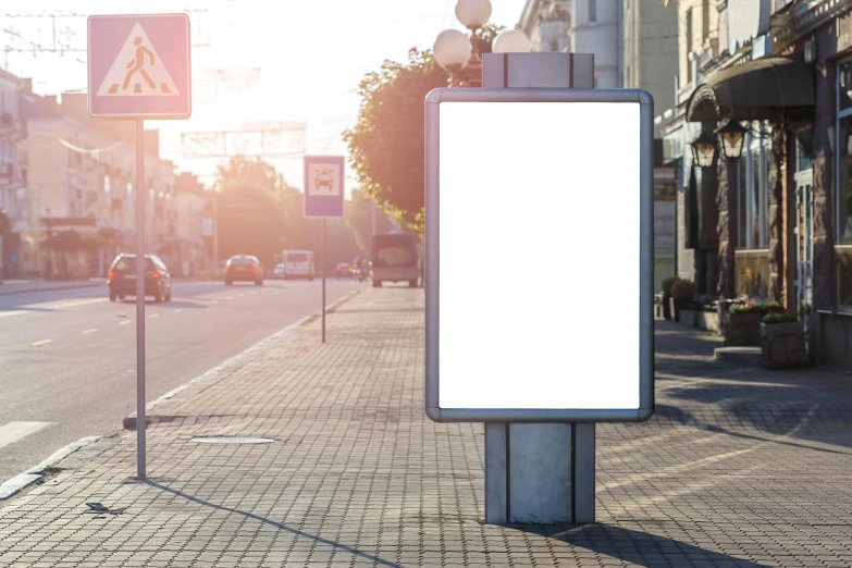 a white sign sitting on the side of a road, a poster, shutterstock, visual art, square, city quality lighting, in the sun, no - text no - logo