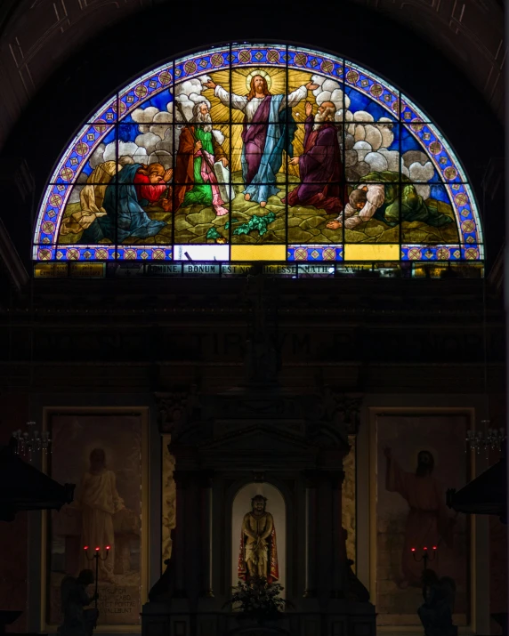 a large stained glass window in a church, by Cagnaccio di San Pietro, pexels contest winner, mannerism, buenos aires, biblically accurate, displayed on an altar, the panorama