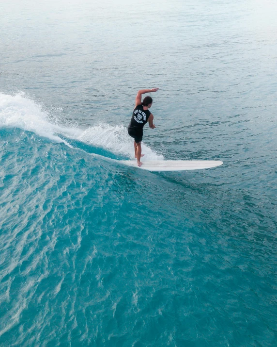 a man riding a wave on top of a surfboard, pexels contest winner, renaissance, thumbnail, indonesia, low quality photo, no watermark