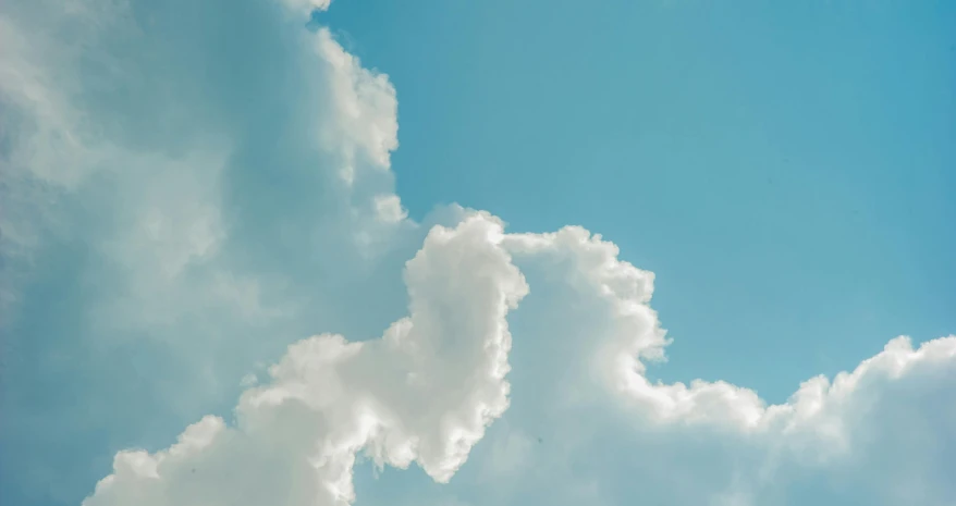 a jetliner flying through a cloudy blue sky, by Carey Morris, pexels contest winner, magic realism, clouds of vivid horse-hair wigs, guinea pig looking up at the sky, cloudless blue sky, steam clouds