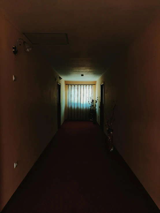 a long hallway with a light at the end of it, an album cover, inspired by Elsa Bleda, unsplash, soviet apartment, ultra realistic 8k octan photo, hotel room, 90's photo