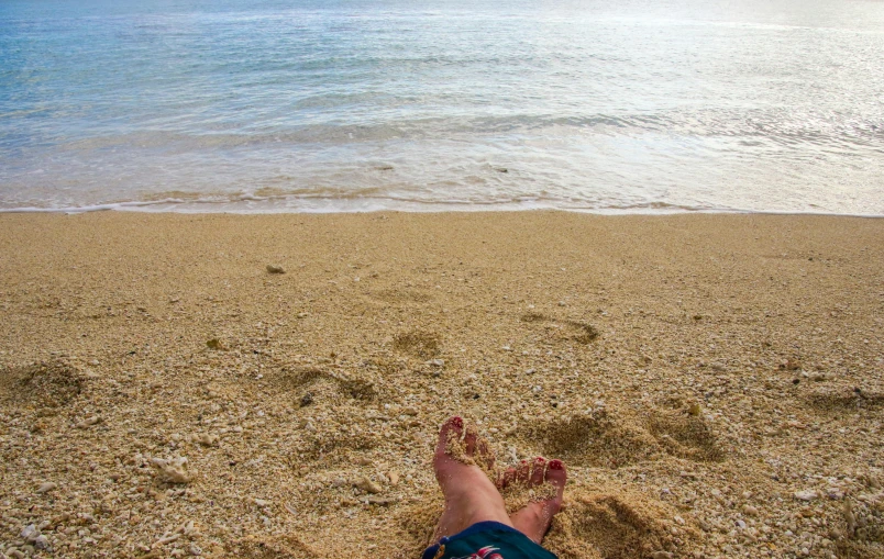 a person's feet in the sand on a beach, a picture, islandpunk, profile image, fan favorite, puerto rico
