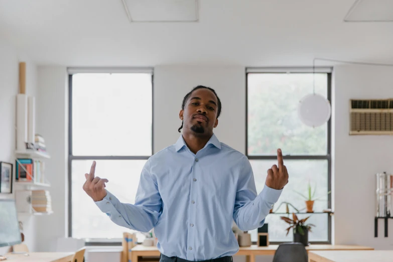 a man standing in an office with his hands in the air, by Washington Allston, pexels contest winner, default pose neutral expression, avatar image, thinking pose, jemal shabazz