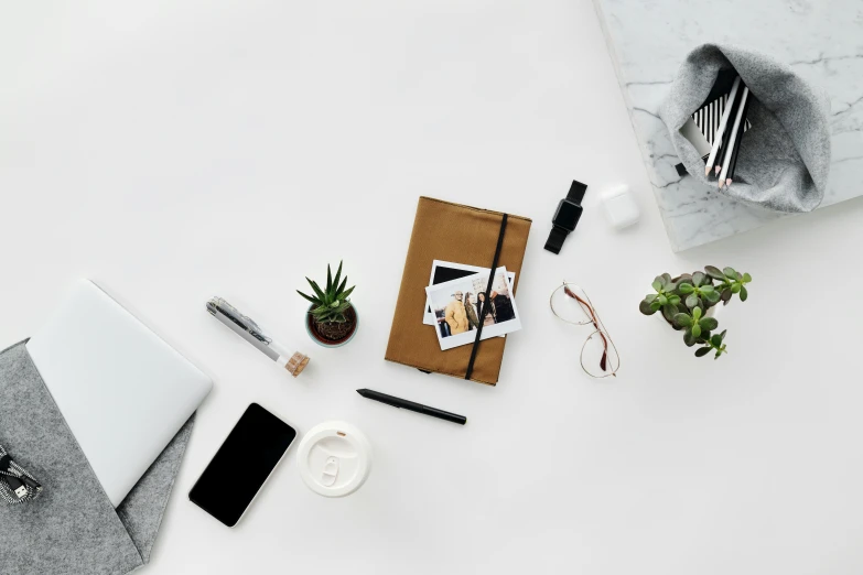 a laptop computer sitting on top of a white table, a picture, inspired by Eden Box, trending on pexels, knolling, elegantly dressed, white background”, full product shot