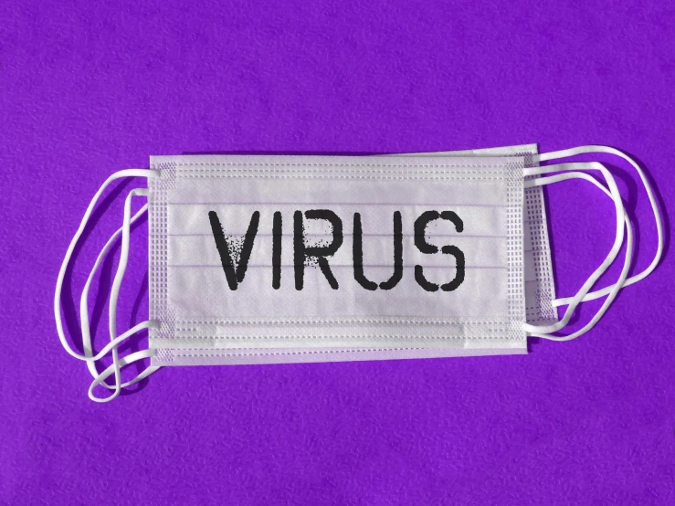 a face mask with the word virus on it, an album cover, trending on pexels, fluxus, ((purple)), sirius, circa 1 9 9 9, let's get dangerous