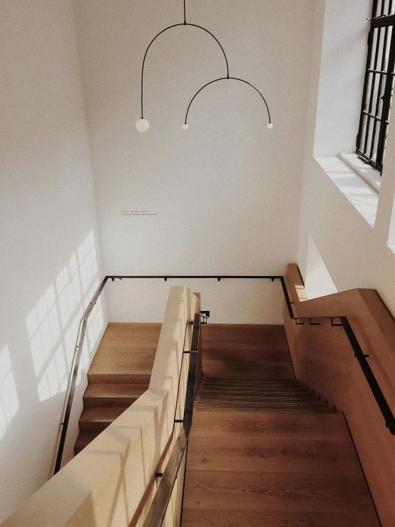 a staircase leading up to the top of a building, inspired by Constantin Hansen, light and space, gallery lighting, wood and gold details, trending on vsco, the narthex