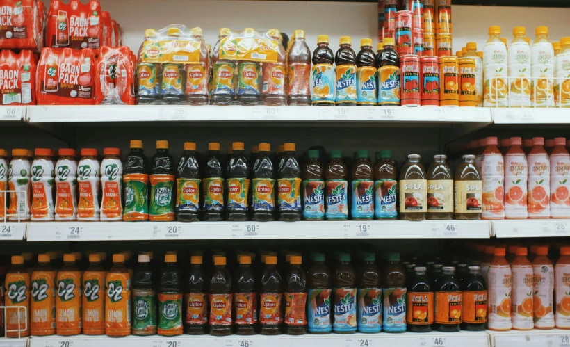 a shelf filled with lots of different types of drinks, pexels, hyperrealism, inside a supermarket, 2 5 6 x 2 5 6 pixels, iowa, suns