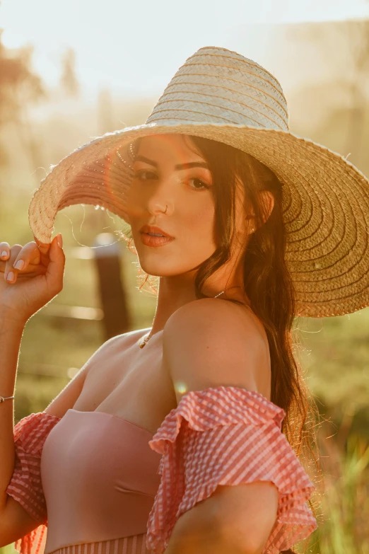 a woman wearing a straw hat in a field, by Adam Marczyński, demi rose, sun lighting, upper body image, 5 0 0 px models