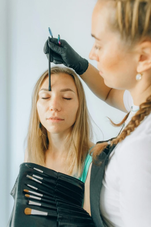 a woman getting her hair done at a salon, an airbrush painting, trending on pexels, mannerism, black eye shadow, academic painting, thumbnail, black