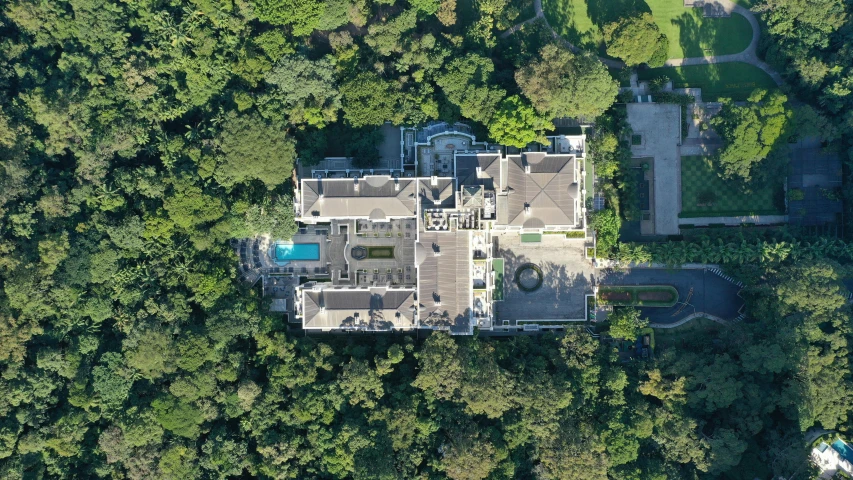 an aerial view of a mansion surrounded by trees, sao paulo, high resolution ultradetailed, gigapixel maximum upscale, helipad