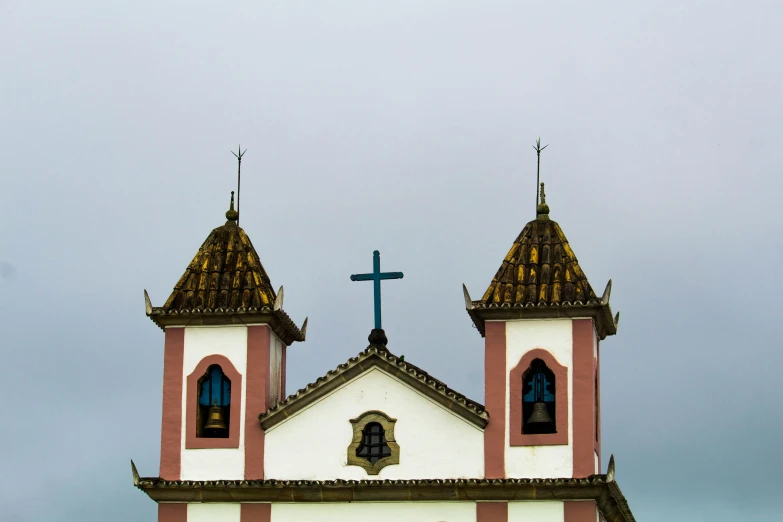 a church with a clock on the front of it, pexels contest winner, shipibo, cross, icaro carvalho, 2 5 6 x 2 5 6 pixels