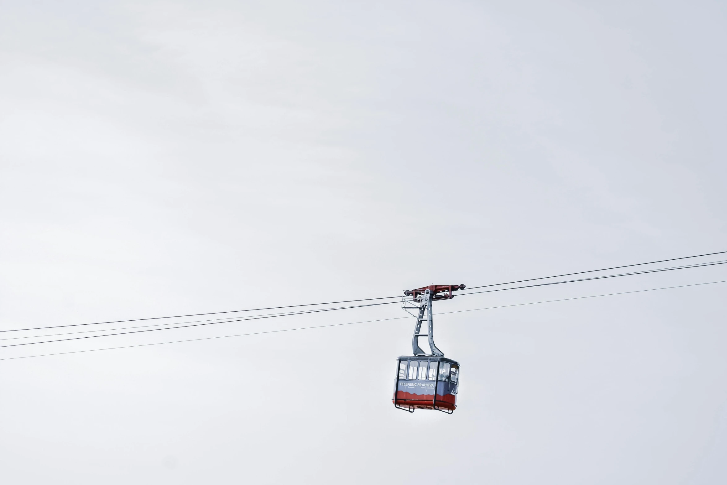 a cable car sitting on top of a snow covered slope, by Tobias Stimmer, pexels contest winner, bauhaus, 'white background'!!!, floating in the sky, 🦩🪐🐞👩🏻🦳, low detail