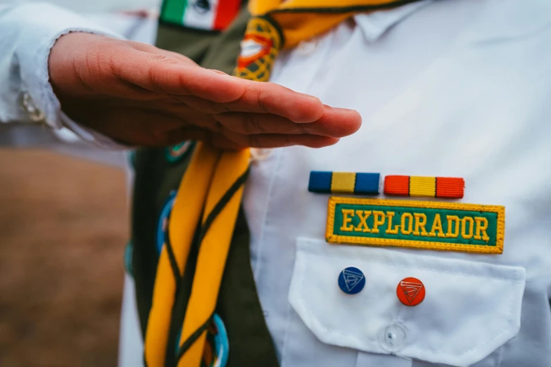 a close up of a person wearing a uniform, trending on unsplash, explorers, mexican, campy and colorful, hand