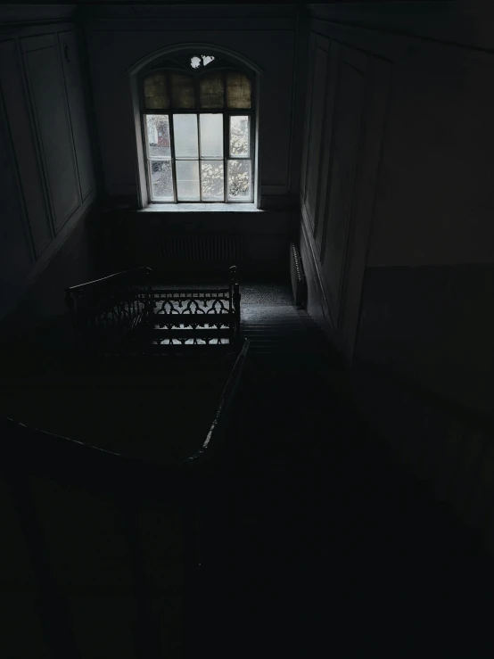 a dark room with a bed and a window, unsplash contest winner, baroque, highrise made up staircases, low quality photo, ( ( ( in a dark, walking down a marble stairwell