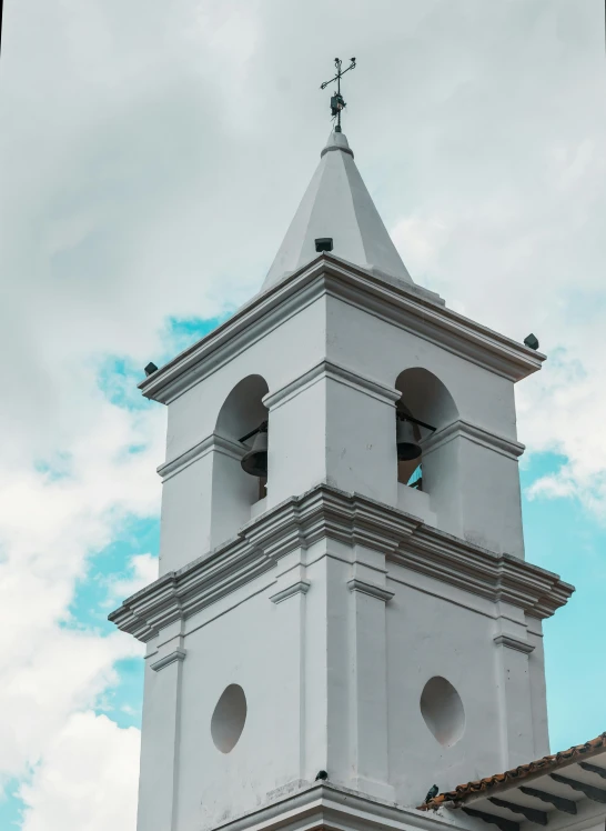 a white clock tower with a blue sky in the background, by Carey Morris, trending on unsplash, quito school, square, standing in a church, high quality photo, plain background