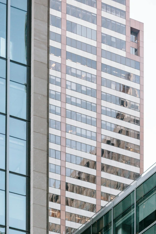 a couple of tall buildings next to each other, a photo, by William Berra, unsplash, ultra high pixel detail, pink marble building, 15081959 21121991 01012000 4k, large vertical blank spaces