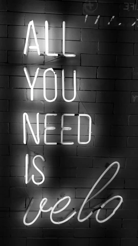 a neon sign that says all you need is hello, a poster, by Robbie Trevino, pexels, blanco y negro, neon!! light, a friend in need, black and white artwork