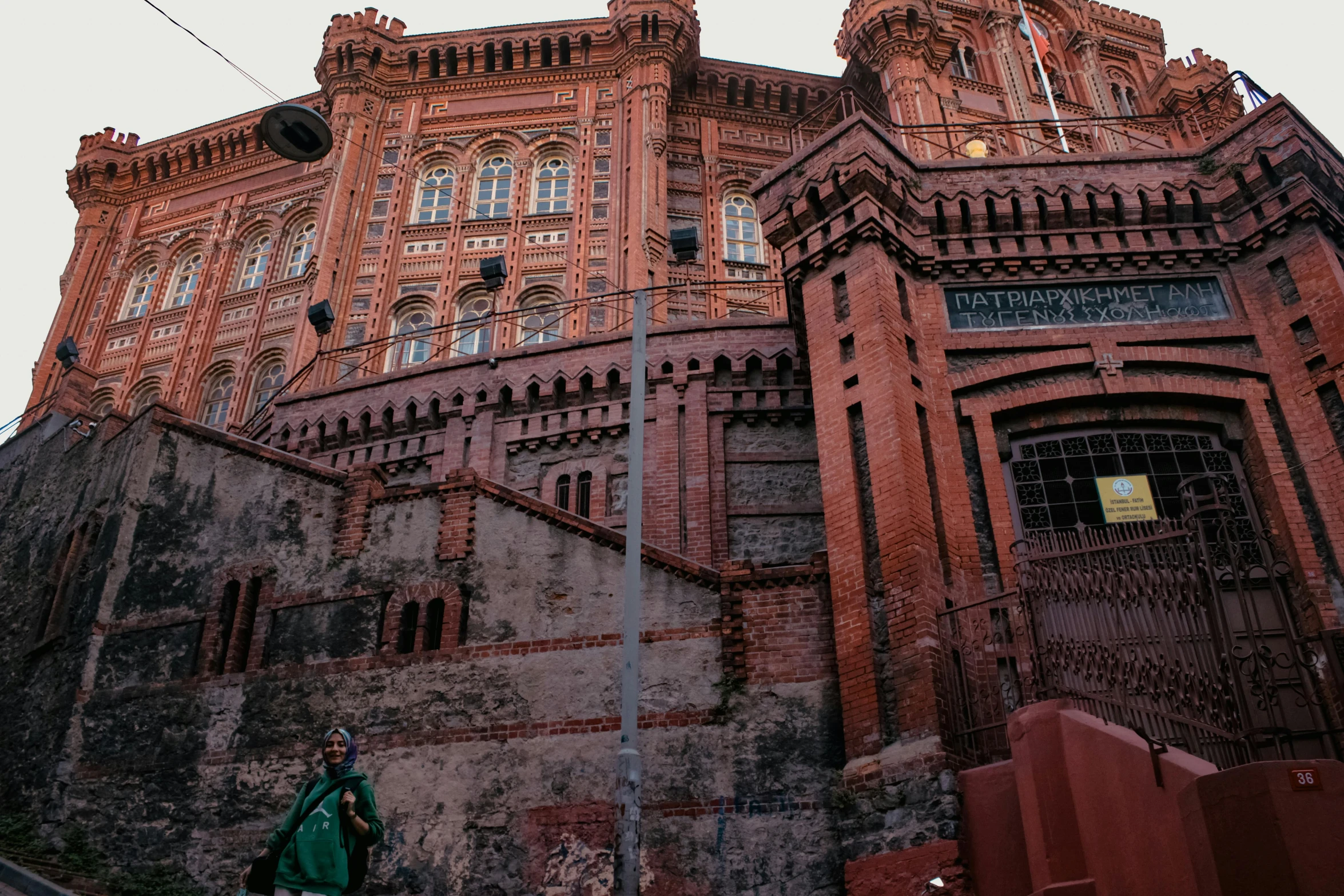 a tall brick building with a clock tower, an album cover, pexels contest winner, heidelberg school, norilsk, thumbnail, 'the red citadel, profile image