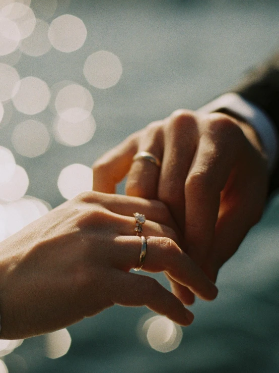 a close up of a person holding a wedding ring, trending on unsplash, romanticism, thumbnail, facing each other, 15081959 21121991 01012000 4k