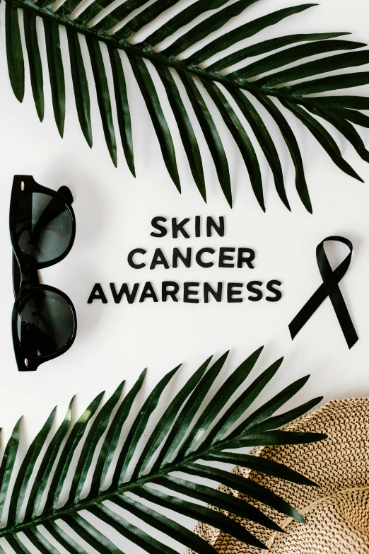 a hat, sunglasses, and palm leaves on a white background with the words skin cancer awareness, by Gavin Hamilton, trending on pexels, human skin, ribbon, in a dark, can