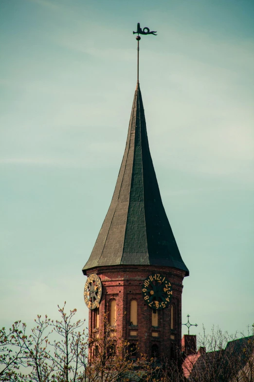 a tall tower with a clock on top of it, by Jan Tengnagel, unsplash, detmold, rounded roof, from 1890, tula