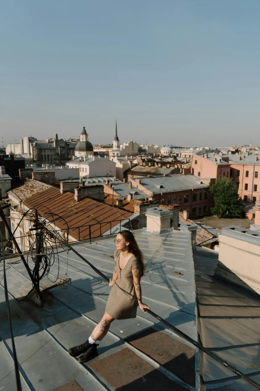 a woman standing on the roof of a building, by Serhii Vasylkivsky, ultrawide image, brown, square, cinematic shot ar 9:16 -n 6 -g