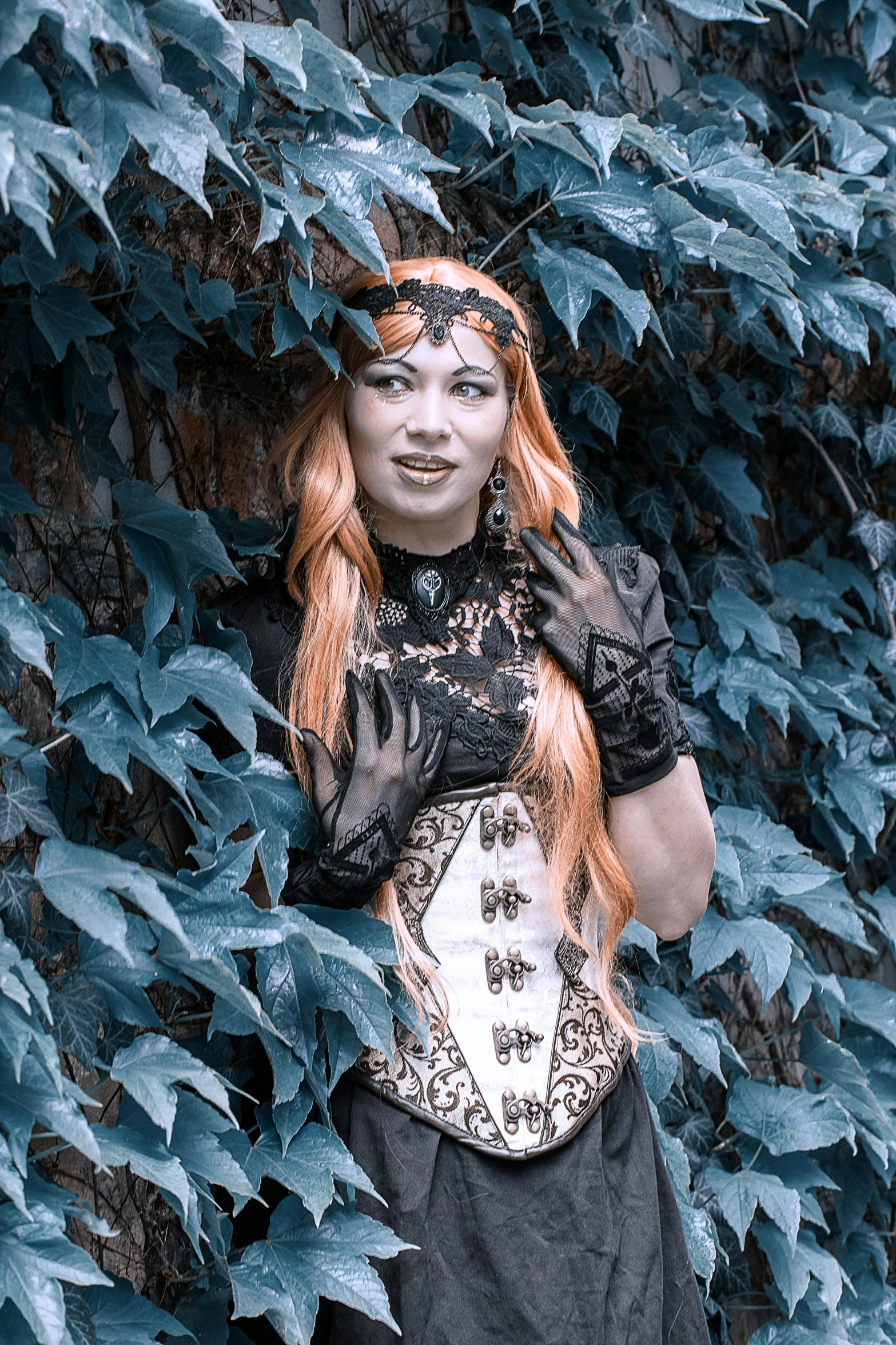 a woman dressed in black and white posing for a picture, an album cover, inspired by Eleanor Fortescue-Brickdale, unsplash, maiden with copper hair, cyberpunk in foliage, ornate cosplay, taken in the late 2000s