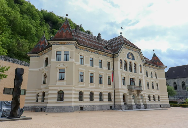 a large building with a statue in front of it, inspired by Rudolf von Alt, danube school, grand majestic mountains, at the museum, white buildings with red roofs, military buildings