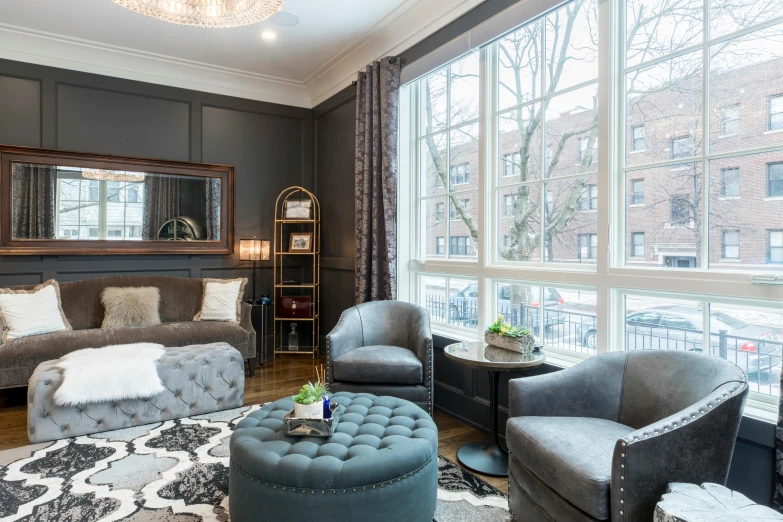 a living room filled with furniture and a large window, inspired by William Home Lizars, 2019 trending photo, apartment design, multiple stories, chesley