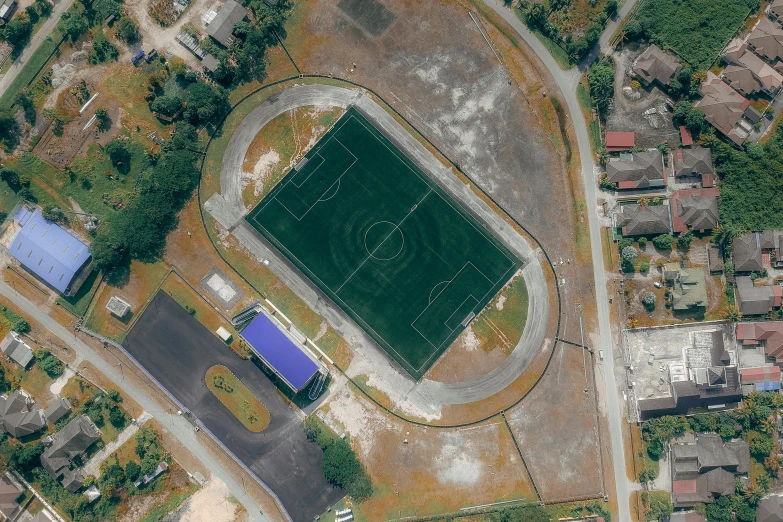 an aerial view of a soccer field, inspired by Jan Asselijn, reddit, nasa true color 8k image, square, uploaded, helipad