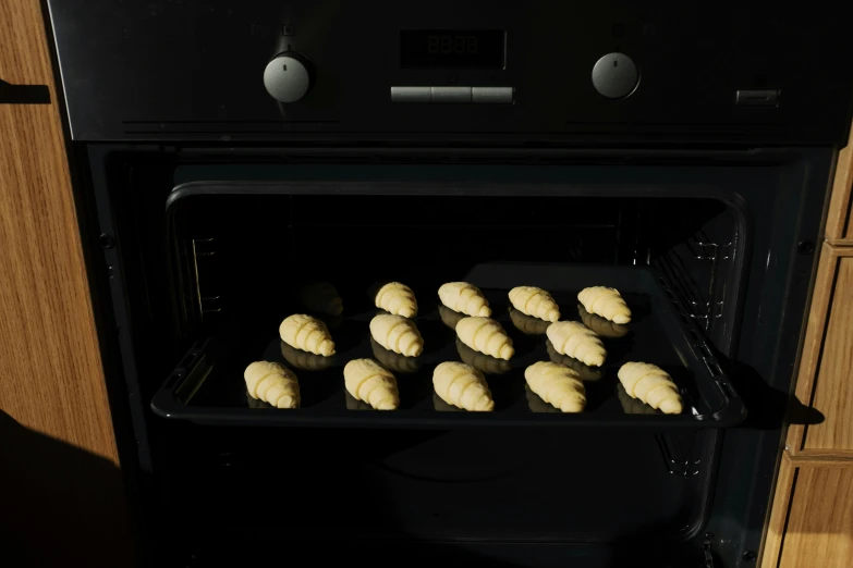 freshly baked croissants are being taken out of the oven, a pastel, toggles, 1 0, b&w hasselblatt, mandelbrot set