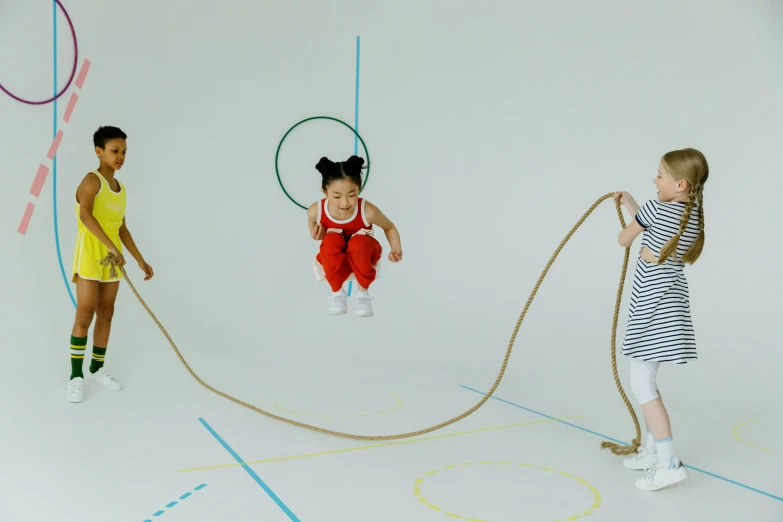 three children playing a game of hop hop hop hop hop hop hop hop hop hop hop hop hop hop hop hop hop hop hop hop hop hop, by Fei Danxu, pexels contest winner, interactive art, ropes, wide shot 4k result, sana takeda, full body 8k