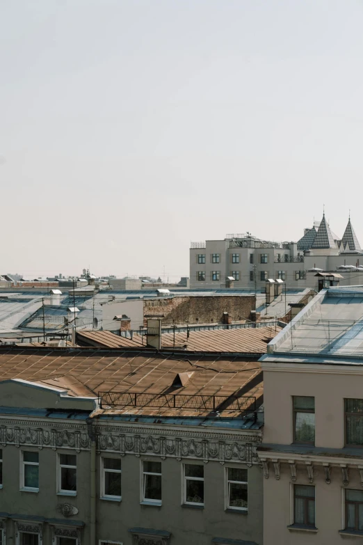 a view of a city from the top of a building, kremlin, simple gable roofs, shot with sony alpha, afar