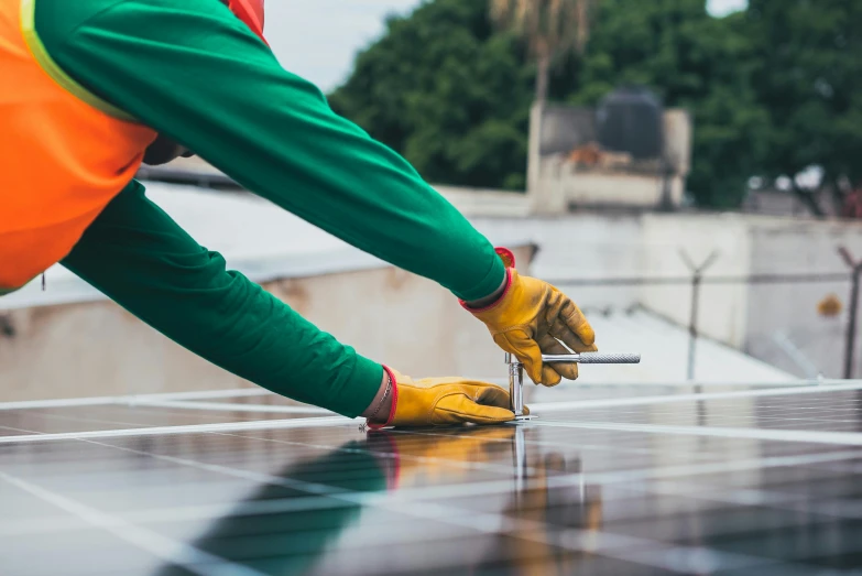 a worker installing solar panels on the roof of a building, pexels contest winner, renaissance, avatar image, colored photo, thumbnail, print ready