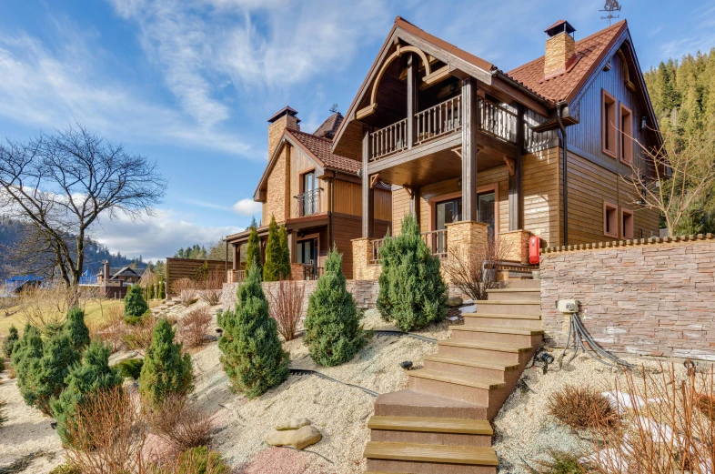 a wooden house sitting on top of a hill, pexels contest winner, art nouveau, several cottages, luxury materials, high quality photo, located in hajibektash complex