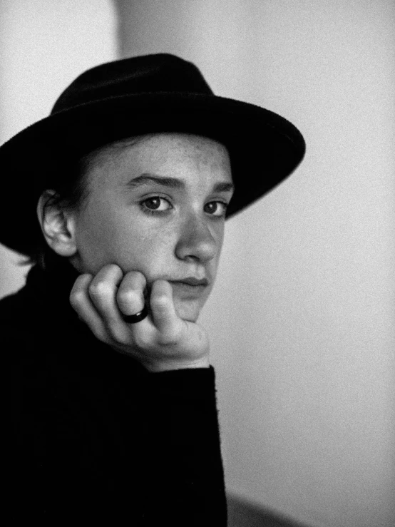 a black and white photo of a man wearing a hat, by Antanas Sutkus, beautiful androgynous prince, jesse pinkman, 1990 photograph, portrait of florence pugh