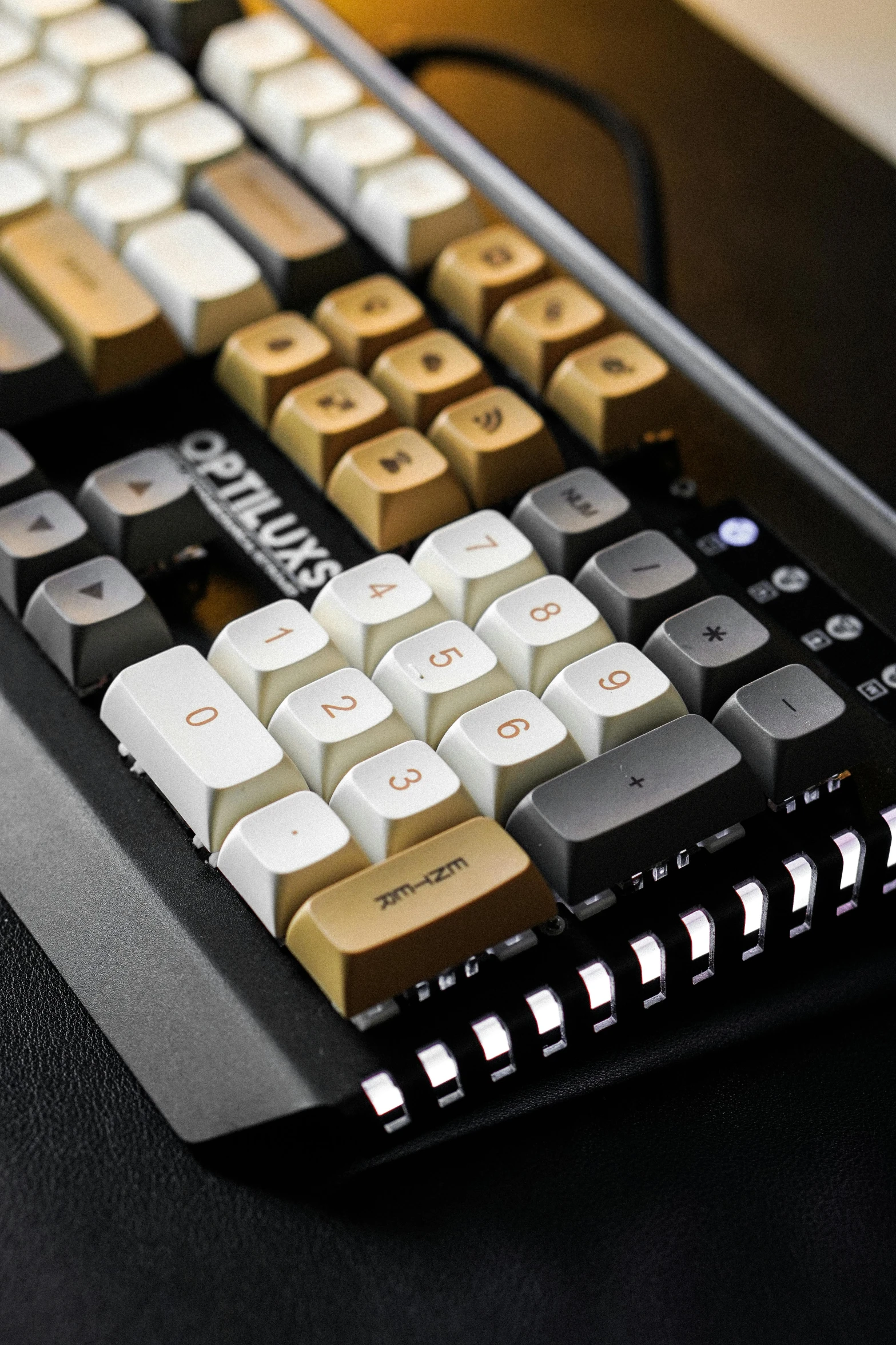 a computer keyboard sitting on top of a desk, muted brown yellow and blacks, octane 1 2 8 k, swanland, detailed product image