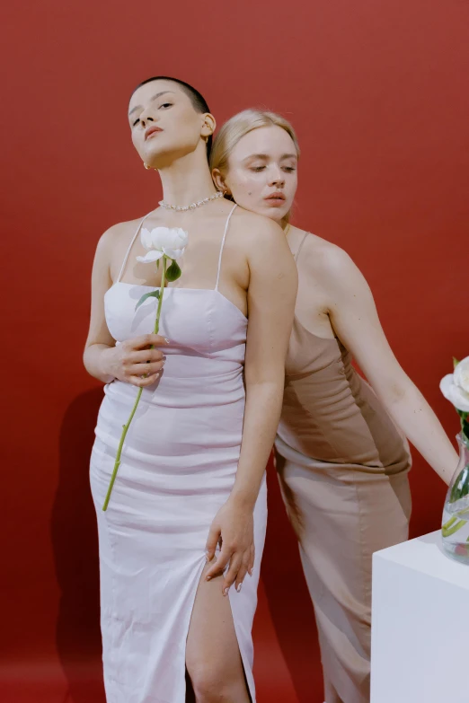 a couple of women standing next to each other, an album cover, aestheticism, flowers grow from the body, elle fanning), shot in the photo studio, ignant