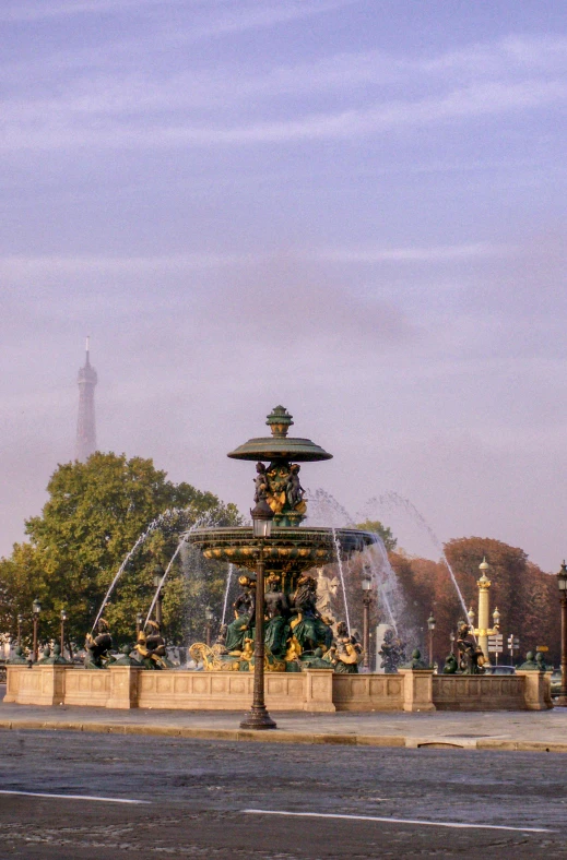a view of the eiffel tower from across the street, visual art, featuring flowing fountains, morning, november, panorama