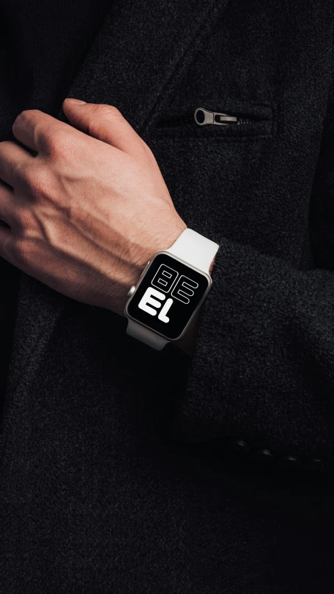 a close up of a person wearing a watch, inspired by Eero Snellman, digital display, thumbnail, in white lettering, square