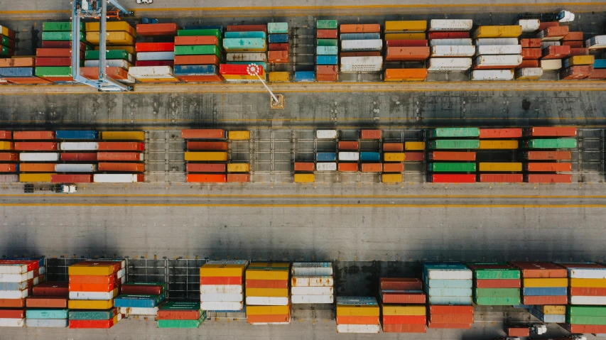 a group of containers stacked on top of each other, pexels contest winner, wide overhead shot, lined up horizontally, gif, james collinson