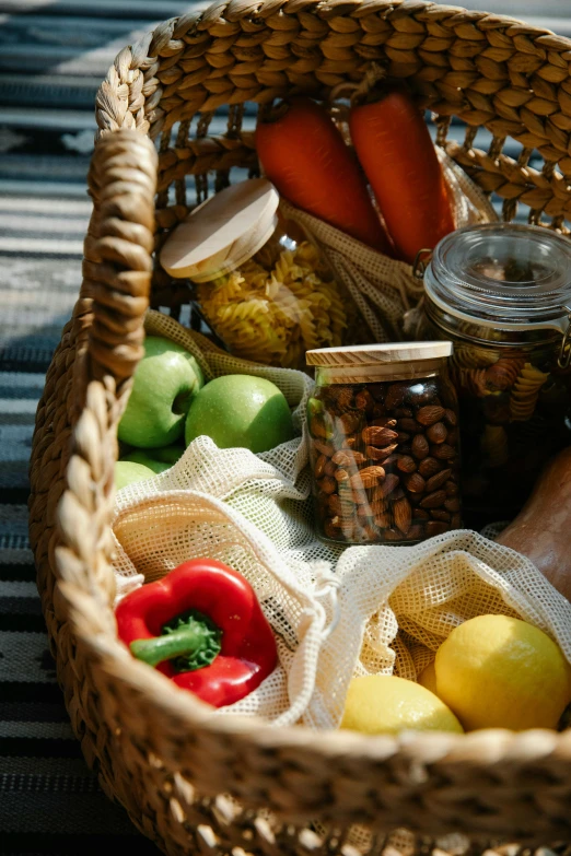 a wicker basket filled with fruits and vegetables, snacks, sustainable materials, inside a glass jar, slide show