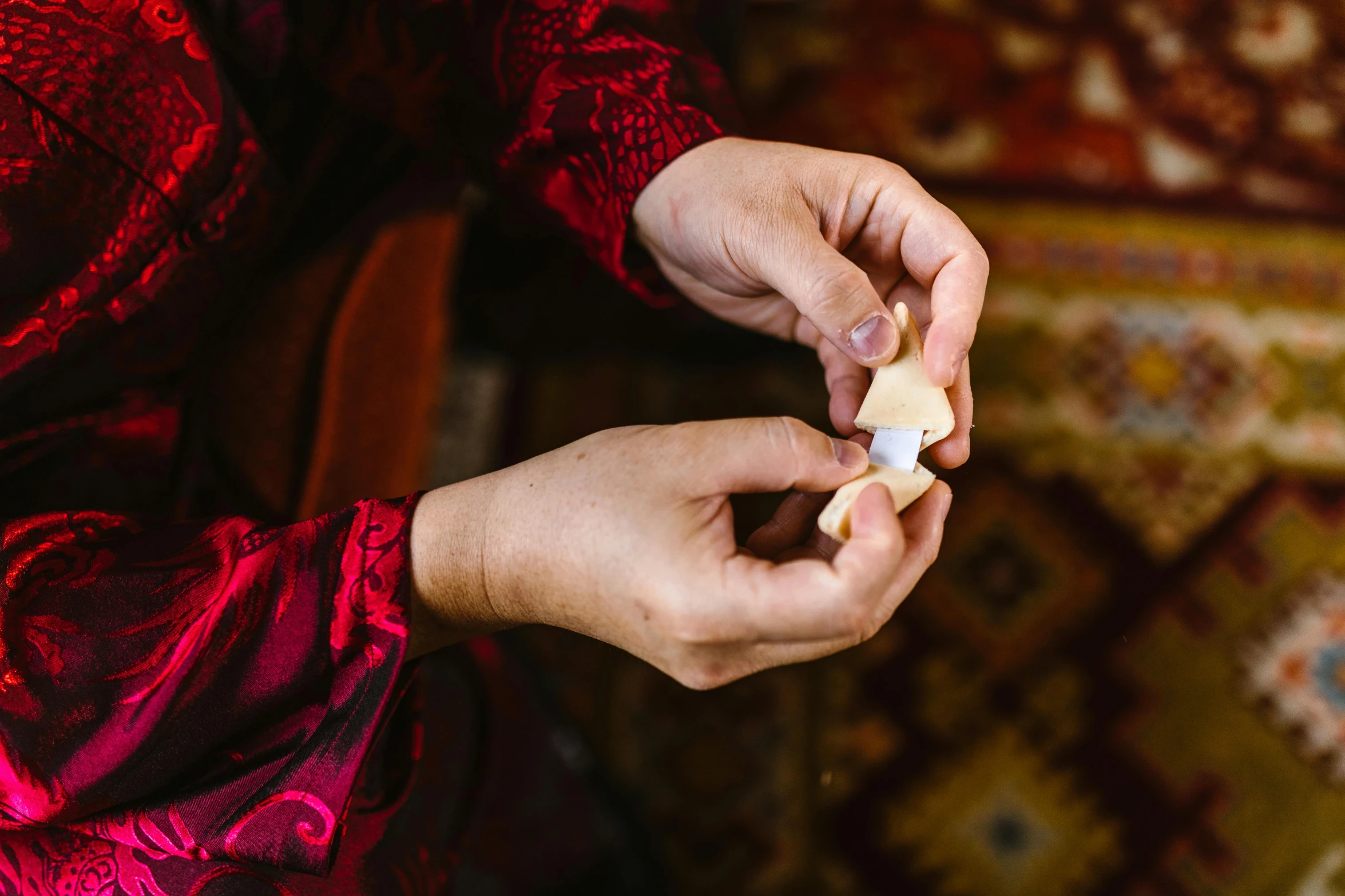 a close up of a person holding something in their hands, a jigsaw puzzle, by Julia Pishtar, orthodox, made of cheese, thumbnail, a cozy