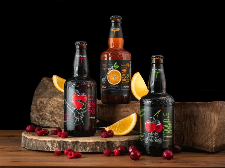 three bottles of beer sitting on top of a wooden table, by Tuvia Beeri, berries dripping juice, with a black background, fruit trees, dark oranges reds and yellows