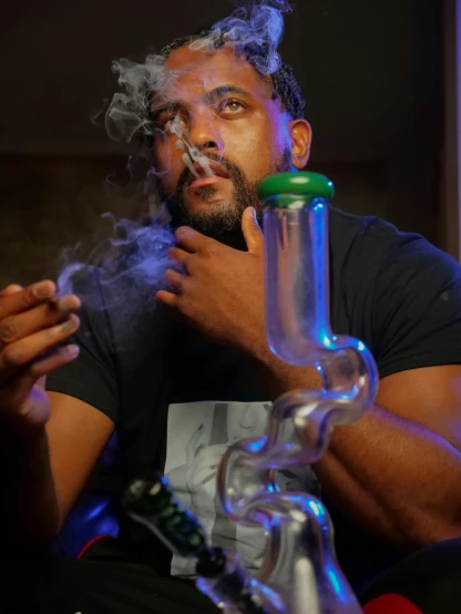 a man sitting in a chair smoking a cigarette, trending on reddit, smoking a magical bong, profile image, ( ( theatrical ) ), thicc build
