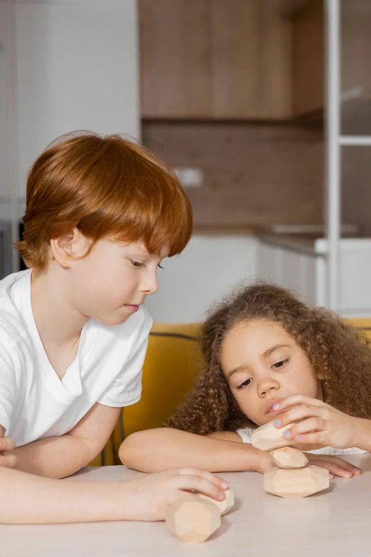 a couple of kids sitting at a table with doughnuts, bandage on arms, drinking cough syrup, sitting on couch, slide show