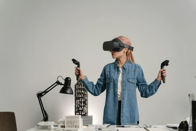 a woman standing in front of a desk wearing a virtual reality headset, unsplash, hypermodernism, construction, full object in middle, student, press shot