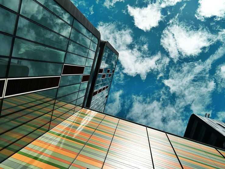 a couple of buildings that are next to each other, an album cover, unsplash, bauhaus, prismatic cumulus clouds, sustainable architecture, lacquered glass, high definition photo