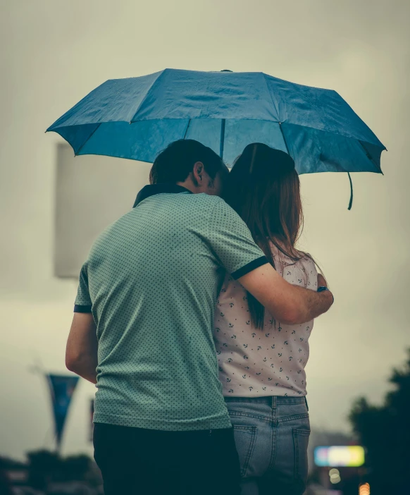 a man and a woman standing under an umbrella, trending on unsplash, blue and grey, lgbt, instagram picture, heartbroken