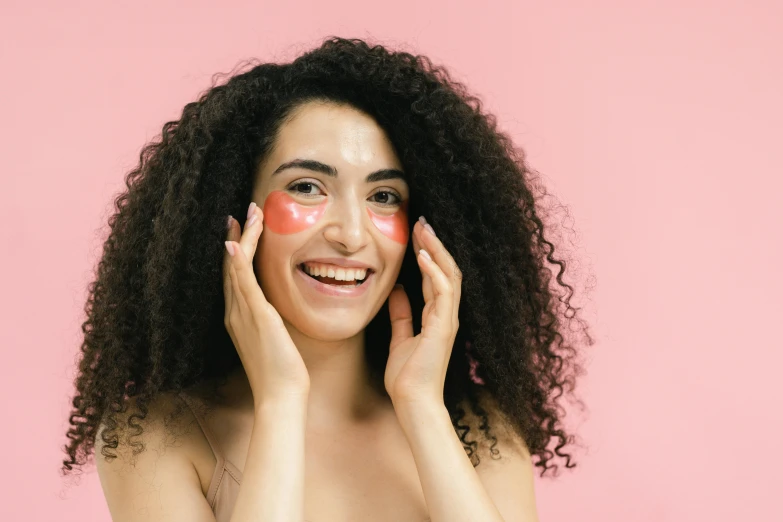 a woman with a lot of makeup on her face, trending on pexels, happening, holding a pudica pose, looking happy, silicone skin, muskular